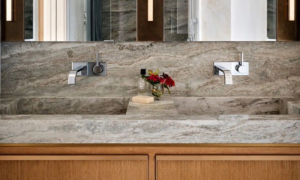 Design Tips for Integrating Natural Stone Countertops into Modern Bathroom Vanities